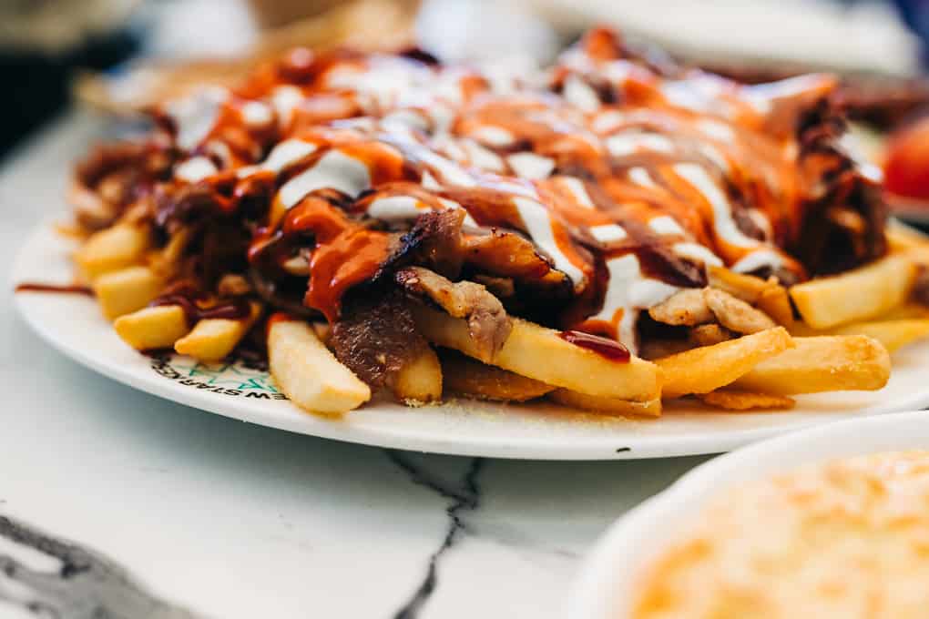Halal snack pack on a plate at New Star Kebab